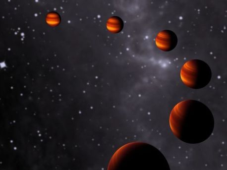 In dieser künstlerischen Darstellung sind die verschiedenen Phasen von Corot-1b zu sehen, während er seine Sonne umkreist. Da der Exoplanet eine gebundene Rotation um seinen Zentralstern vollführt, ist auf der einen Seite immer Tag, auf der anderen immer Nacht.