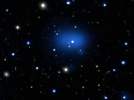 This is a composite image of the most distant galaxy cluster yet detected.