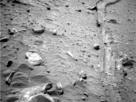 Spirit's last tracks. This view from Spirit's navigation camera shows tracks left by the rover as it drove backward, dragging its inoperable right-front wheel, to the location where the rover became trapped in soft sand in April 2009.
