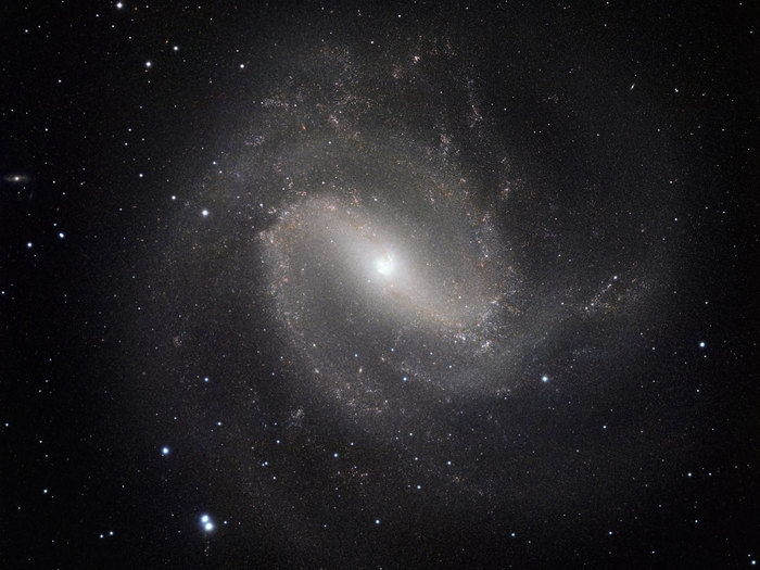 This image of the nearby galaxy Messier 83 was taken in the infrared part of the spectrum with the HAWK-I instrument on ESO’s Very Large Telescope. The very fine image quality of this camera, coupled with the huge light-collecting power of the VLT, reveals vast numbers of stars within the galaxy. The images were taken in three different parts of the infrared spectrum and the total exposure time was eight and a half hours, split into more than five hundred exposures of one minute each. The field of view is about 13 arcminutes across.