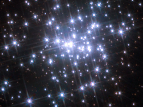The core of the star cluster in NGC 3603 is shown in great detail in an image from the Wide Field Planetary Camera 2 (WFPC2) camera on the NASA/ESA Hubble Space Telescope. The image is a colour composite of observations in the WFPC2 filters F555W (blue), F675W (green) and F814W (red). This view shows the second of two images taken ten years apart that were used to detect the motions of individual stars within the cluster for the first time. The field of view is about 20 arcseconds across.