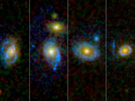 Astronomers have found unexpected rings and arcs of ultraviolet light around a selection of galaxies, four of which are shown here as viewed by NASA's and the European Space Agency's Hubble Space Telescope.

Observations from NASA's Galaxy Evolution Explorer (GALEX) picked out 30 elliptical and lens-shaped "early-type" galaxies with puzzlingly strong ultraviolet emissions but no signs of visible star formation. Early-type galaxies, so the scientists' thinking goes, have already made their stars and now lack the cold gas necessary to build new ones.

Hubble images captured the great, shining rings of ultraviolet light, with some ripples stretching 250,000 light-years.

In these Hubble images, ultraviolet light has been rendered in blue, while green and red light from the galaxies is shown in their natural colors.