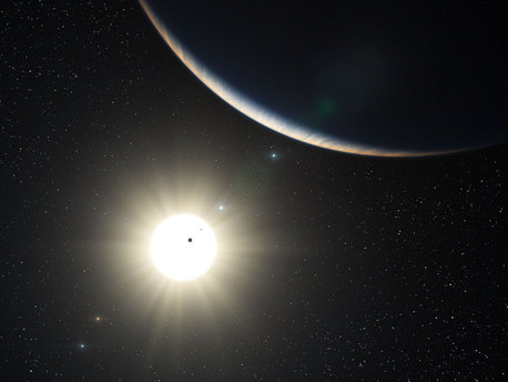 This artist’s impression shows the remarkable planetary system around the Sun-like star HD 10180. Observations with the HARPS spectrograph, attached to ESO’s 3.6-metre telescope at La Silla, Chile, have revealed the definite presence of five planets and evidence for two more in orbit around this star. This system is similar to the Solar System in terms of number of planets and the presence of a regular pattern in the sizes of the orbits. If confirmed the closest planet detected would be the lightest yet known outside the Solar System, with a mass that could be only about 1.4 times that of the Earth.

The large crescent is the third world in the system (HD 10180d), which is comparable to the planet Neptune in mass. The two inner planets appear as silhouettes in transit across the bright disc of the star. The outer planets in the system appear in the background sky.