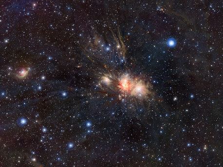 This dramatic infrared image shows the nearby star formation region Monoceros R2, located some 2700 light-years away in the constellation of Monoceros (the Unicorn). The picture was created from exposures in the near infrared bands Y, J and Ks taken by the VISTA survey telescope at ESO’s Paranal Observatory. Monoceros R2 is an association of massive hot young stars illuminating a beautiful collection of reflection nebulae, embedded in a large molecular cloud.