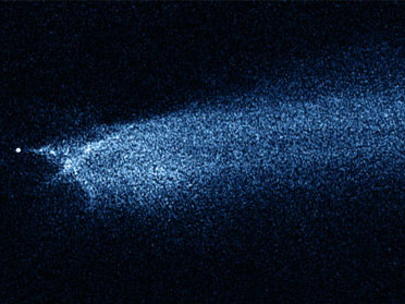 An international team of astronomers has observed what happens after asteroids crash together. Using Hubble to study the aftermath of one such collision over five months, they watched a strange, comet-like debris trail slowly evolve as the collision site orbited the Sun. This research gives clues about how asteroids behave when they collide, and how the fall-out from these impacts contributes to the dust that pervades the Solar System.