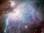 This new image of the Orion Nebula was captured using the Wide Field Imager camera on the MPG/ESO 2.2-metre telescope at the La Silla Observatory, Chile. This image is a composite of several exposures taken through a total of five different filters. Light that passed through a red filter, as well as light from a filter that shows the glowing hydrogen gas, is coloured red. Light in the yellow–green part of the spectrum is coloured green, blue light is coloured blue and light that passed through an ultraviolet filter has been coloured purple. The exposure times were about 52 minutes through each filter. 