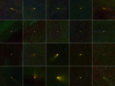 During its one-year mission, NASA's Wide-field Infrared Survey Explorer, or WISE, mapped the entire sky in infrared light. Among the multitudes of astronomical bodies that have been discovered by the NEOWISE portion of the WISE mission are 20 comets.

This collage shows those 20 new comets all together in a kind of family portrait. Most of the comets are named WISE. In four cases, the comet does not bear the name WISE because the object was known before to be an asteroid. The WISE observations revealed their true nature. These objects did not turn out to be stony and/or metallic space rocks as is the case for asteroids. Instead, they were shown to be comets -- snowy dust balls with clouds of dust and gas surrounding them.

When most people think of comets, they think of the popular images of Halley's Comet or Comet Hale-Bopp, with bright, enormous tails. A comet tail forms as the object travels closer to the sun. The ices in the comet are heated and become a gas, escaping the surface of the comet and lifting dust particles away as well. This fuzzy cloud around the comet nucleus is called a coma. As a comet gets closer and closer to the sun, the solar wind and sunlight push the coma away, forming the long tail.

Comets are named by the International Astronomical Union’s Minor Planet Center, and the names indicate the circumstances of discovery. The designations of the comets in the collage, from left to right, top to bottom are: 237P/LINEAR (2002 LN13), 233P/La Sagra (2009 WJ50), P/2009 WX51 (Catalina), P/2010 B2 (WISE), P/2010 D1 (WISE), P/2010 D2 (WISE), C/2010 D3 (WISE), C/2010 D4 (WISE), C/2010 DG56 (WISE), C/2010 E3 (WISE), C/2010 FB87 (WISE-Garradd), C/2010 G3 (WISE), C/2010 J4 (WISE), P/2010 K2 (WISE), C/2010 KW7 (WISE), 237P/LINEAR (2010 L2), C/2010 L4 (WISE), C/2010 L5 (WISE), P/2010 N1 (WISE), and P/2010 P4 (WISE). (Italicized names are the ones that had been previously discovered as minor planets, but were not known to be comets.)

The fuzzy background in each picture is due to random fluctuations in infrared light, primarily from dust in our own solar system. Stars cannot be seen because they are subtracted out during the process of combining multiple WISE pictures together to make this view centered on the moving comets.

The colors in the pictures are representational. Infrared light of 4.6, 12 and 22 microns is colored blue, green and red, respectively. The light emitted from comets in infrared is due to their temperatures, so the cooler objects appear to have more red, while warmer objects will appear more bluish.