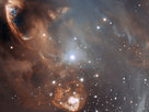 This very detailed false-colour image from ESO’s Very Large Telescope shows the dramatic effects of very young stars on the dust and gas from which they were born in the star-forming region NGC 6729. The baby stars are invisible in this picture, being hidden behind dust clouds at the upper left of the picture, but material they are ejecting is crashing into the surroundings at speeds of that can be as high as one million kilometres per hour. This picture was taken by the FORS1 instrument and records the scene in the light of glowing hydrogen and sulphur.