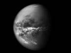NASA's Cassini spacecraft chronicles the change of seasons as it captures clouds concentrated near the equator of Saturn's largest moon, Titan.

Methane clouds in the troposphere, the lowest part of the atmosphere, appear white here and are mostly near Titan's equator. The darkest areas are surface features that have a low albedo, meaning they do not reflect much light. Cassini observations of clouds like these provide evidence of a seasonal shift of Titan's weather systems to low latitudes following the August 2009 equinox in the Saturnian system. (During equinox, the sun lies directly over the equator. See PIA11667 to learn how the sun's illumination of the Saturnian system changed during the equinox transition to spring in the northern hemispheres and to fall in the southern hemispheres of the planet and its moons.)