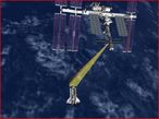 This image illustrates Discovery conducting the Rendezvous Pitch Maneuver before docking to the space station.